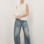 Full outfit Model is wearing Good Luck Barrel Jeans in Washed Denim and white top - front view