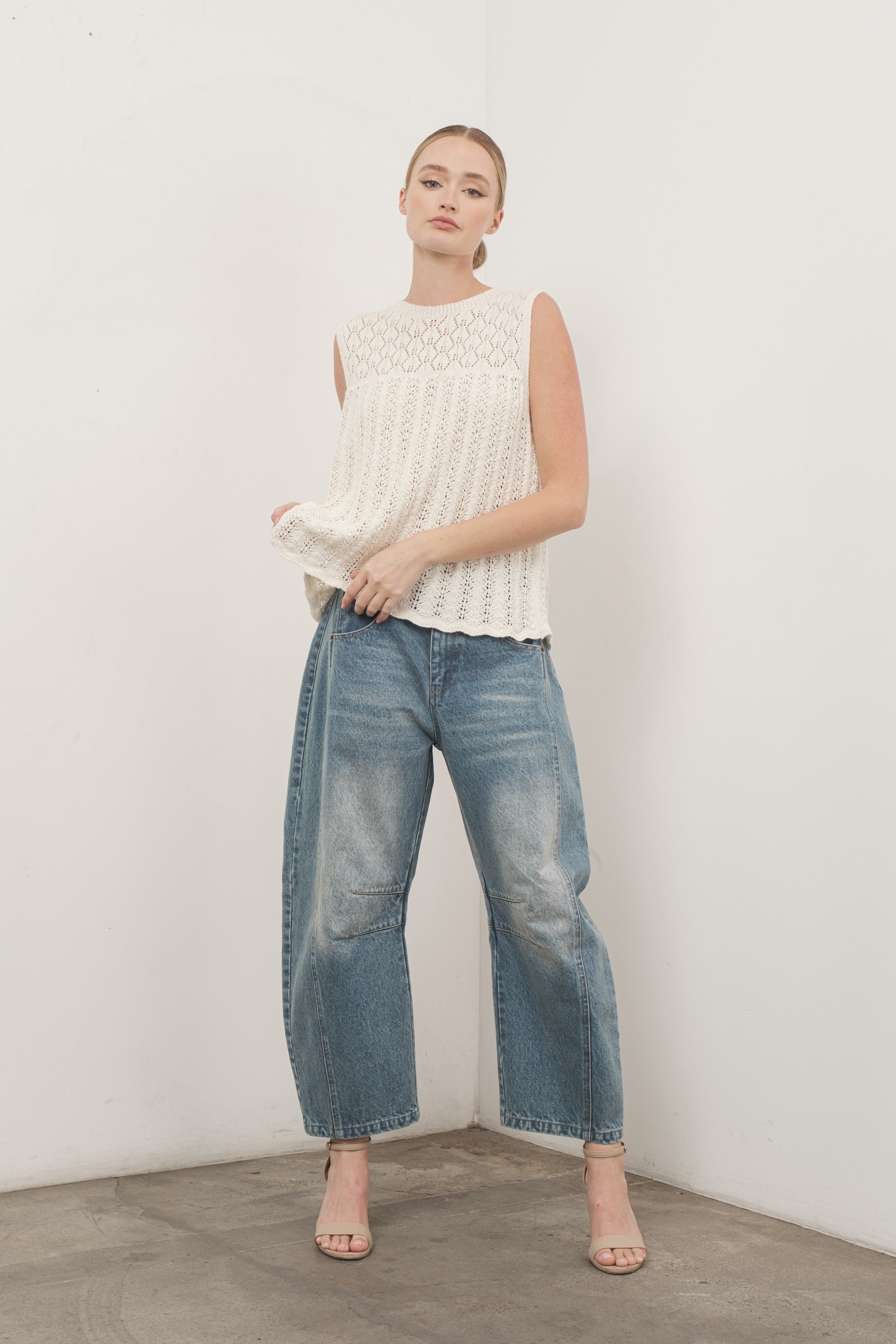 Full outfit Model is wearing Good Luck Barrel Jeans in Washed Denim and white top - front view
