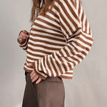 Side view of Hailey Button Down Cardigan in Ivory Brown Stripe paired with brown shorts, relaxed everyday outfit