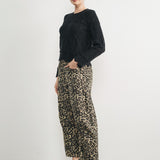 Woman wearing Good Luck Barrel Jeans in Leopard and black sweater - side view