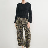 Woman wearing Good Luck Barrel Jeans in Leopard and black sweater - front view