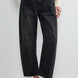Model is wearing  Good Luck Barrel Jeans in Washed Black - front view