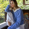 Model is wearing Dusty Blue Piper Hailey Cardigan 