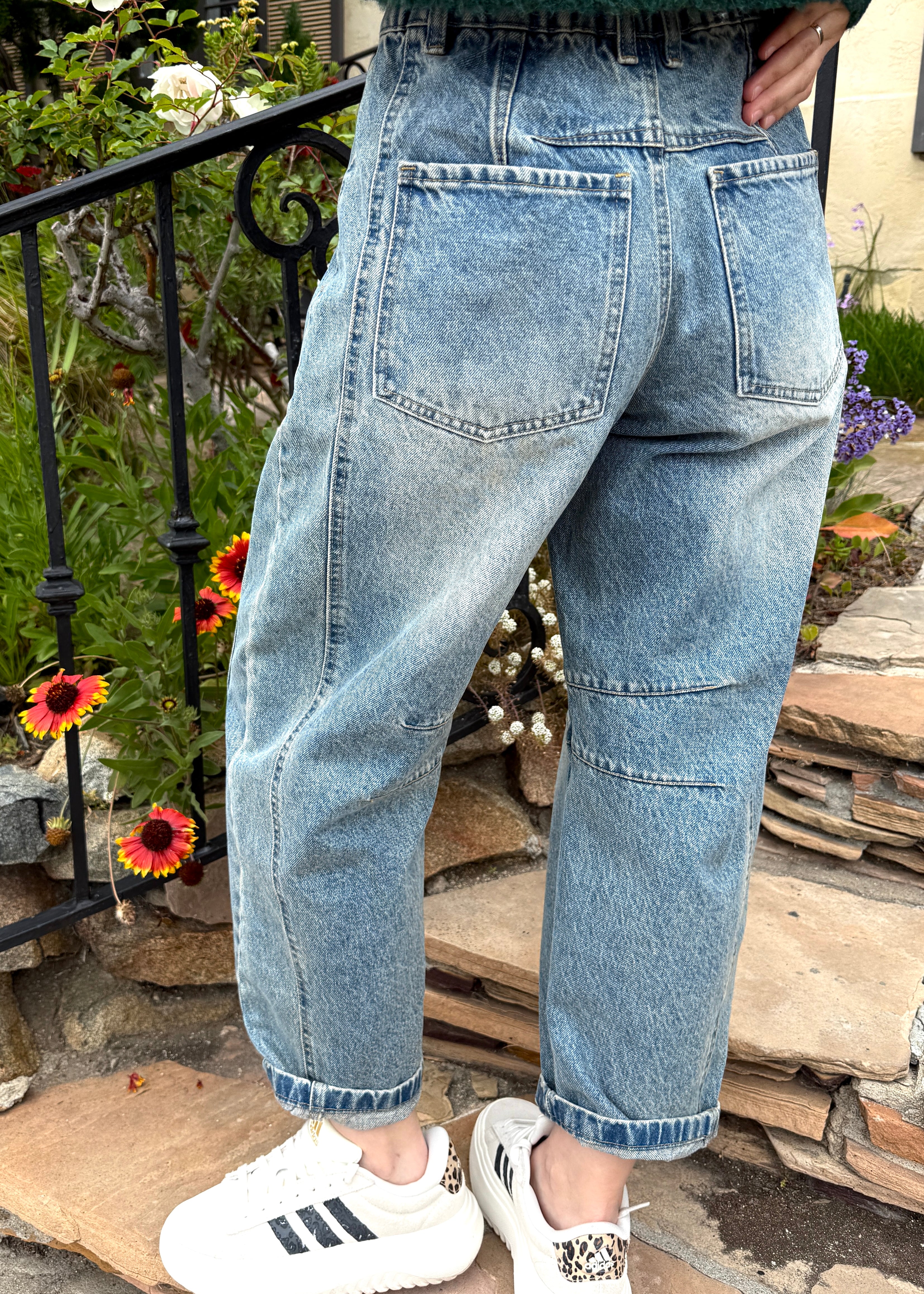 Lifestyle image of Good Luck Barrel Jeans in Washed Denim - back view