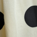 Lowen Full Midi Skirt in Polka Dot Cream -fabric texture close-up
