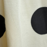 Lowen Full Midi Skirt in Polka Dot Cream -fabric texture close-up