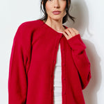Harper Round-Neck Relaxed Cardigan in red styled casually with jeans — soft, cozy women’s layering piece.