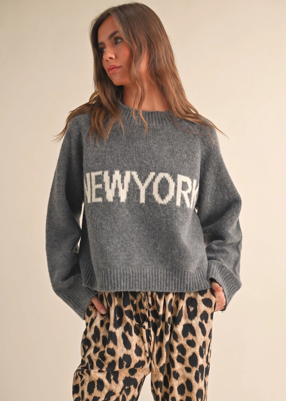Women’s New York Graphic Sweater in Gray with bold NEW YORK lettering