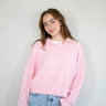 model is wearing Hailey button down cardigan (piper cardigan) in baby pink - front view