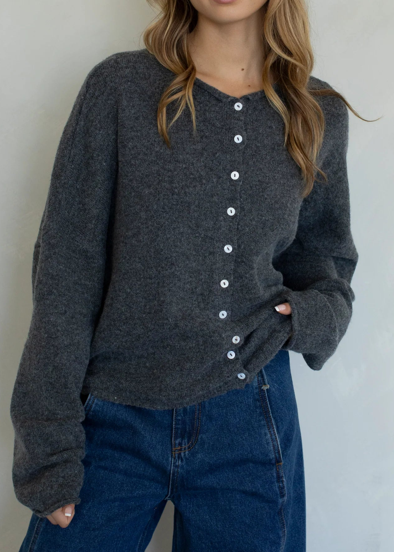 Woman wearing Hailey Button Down Cardigan Charcoal  - front view women's sweater