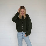Front view of Things Between Piper Cardigan in hunter green - full outfit