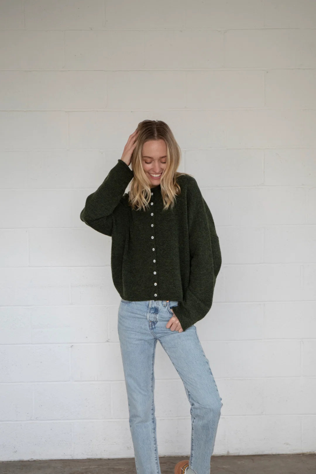 Front view of Things Between Piper Cardigan in hunter green - full outfit