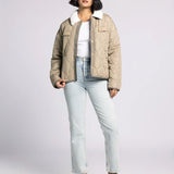 Side view of olive Aura Quilted Puffer Coat with sherpa collar and relaxed fit — stylish women’s winter coat.