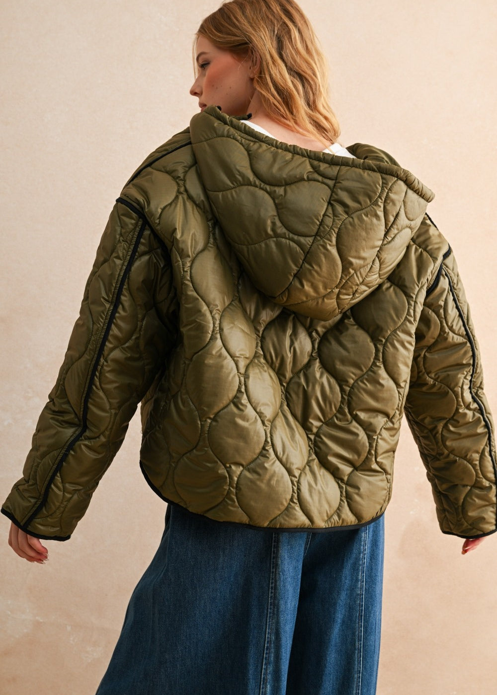Back view of the Ava Hooded Quilted Puffer Jacket in olive showing quilted pattern and hood