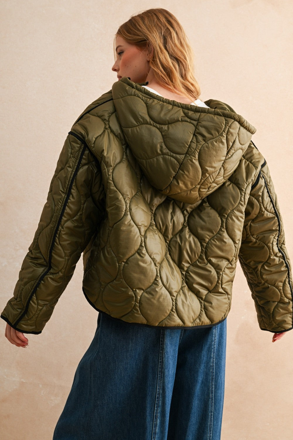 Back view of the Ava Hooded Quilted Puffer Jacket in olive showing quilted pattern and hood