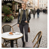 Ava Reversible Sherpa Quilted Vest by Dani West worn outdoors — cozy neutral outerwear for cool-weather layering.