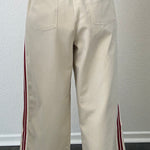 The Brooklin wide-leg pull-on pants in beige, back view with elastic waistband and patch pockets