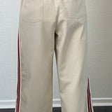The Brooklin wide-leg pull-on pants in beige, back view with elastic waistband and patch pockets