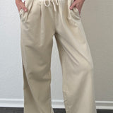 The Brooklin side-stripe pull-on wide-leg pants in beige, front view with elastic waist and tie detail