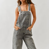 Angled front view of chill denim overall in grey wash for casual everyday wear