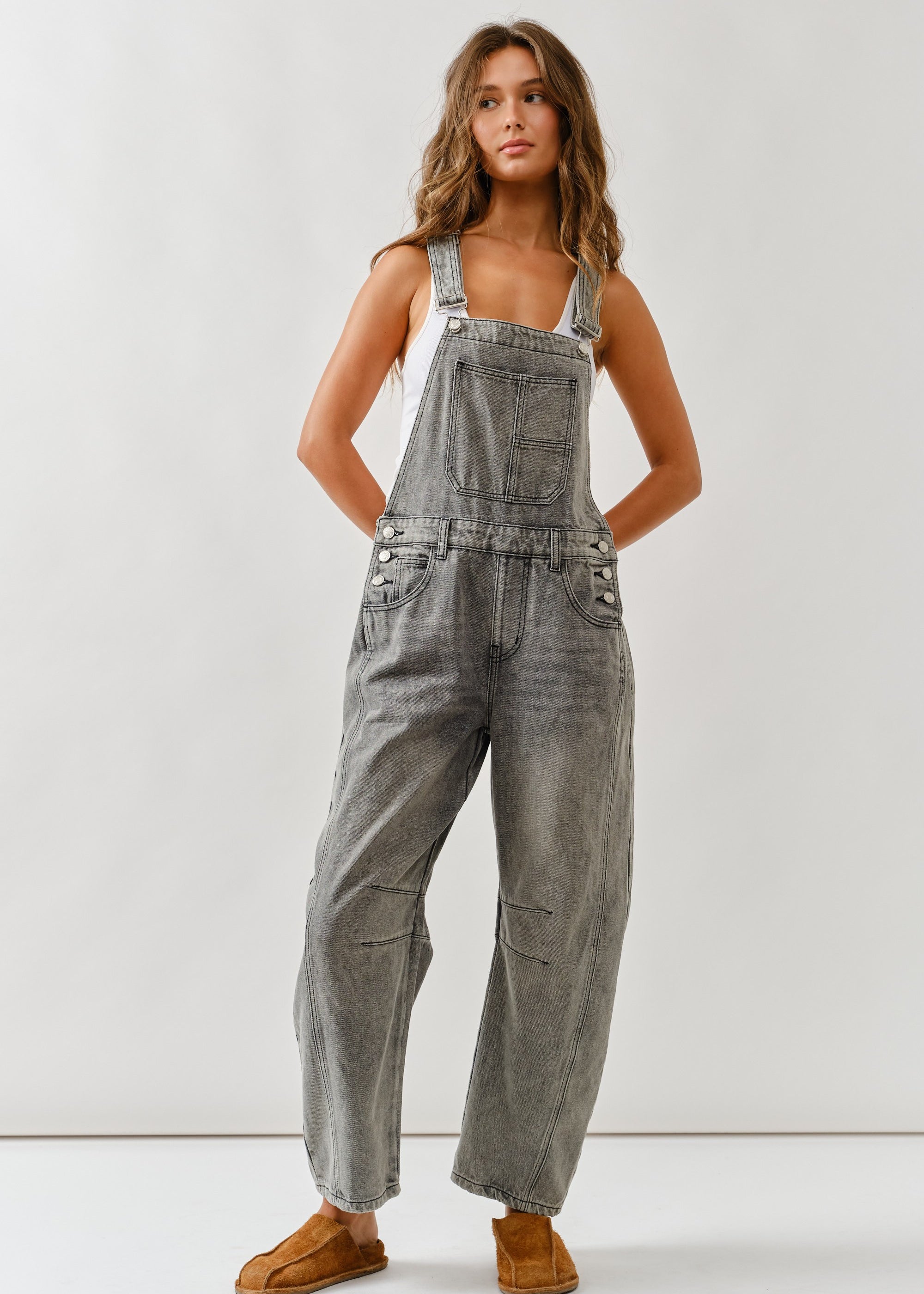 Chill denim overall in grey wash with slouchy relaxed fit and adjustable straps