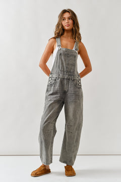Chill denim overall in grey wash with slouchy relaxed fit and adjustable straps