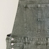 Close-up of Chill Denim Overall in olive denim - close-up front details