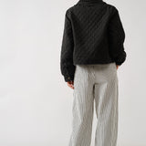 Chloe quilted denim jacket in black, back view