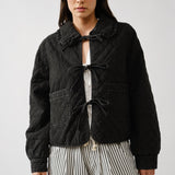 Chloe bow quilted denim jacket in black, front view