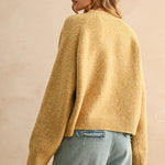 Back view of city print casual sweater in Paris butter