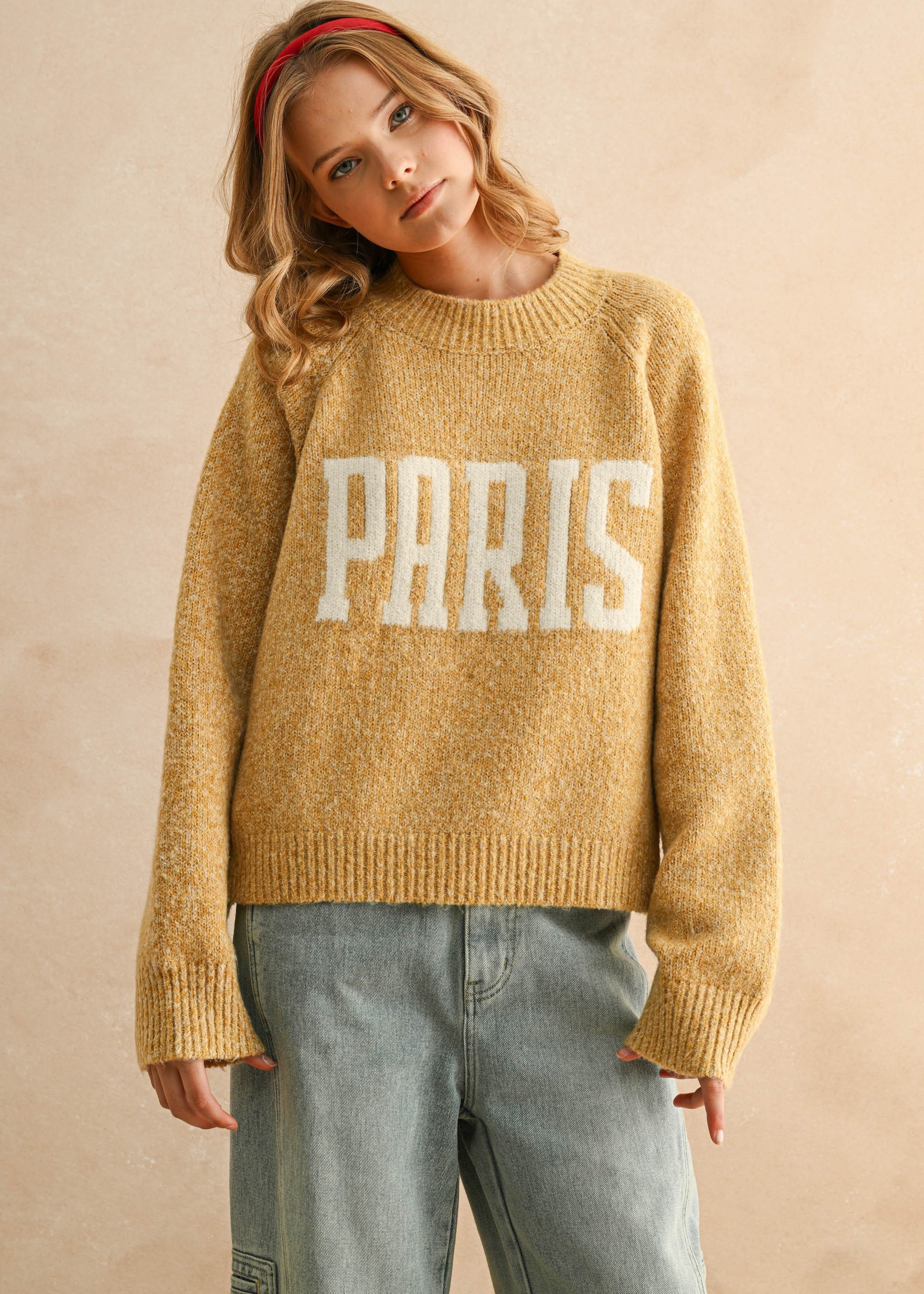 City print casual sweater in Paris butter with relaxed fit and letter front design