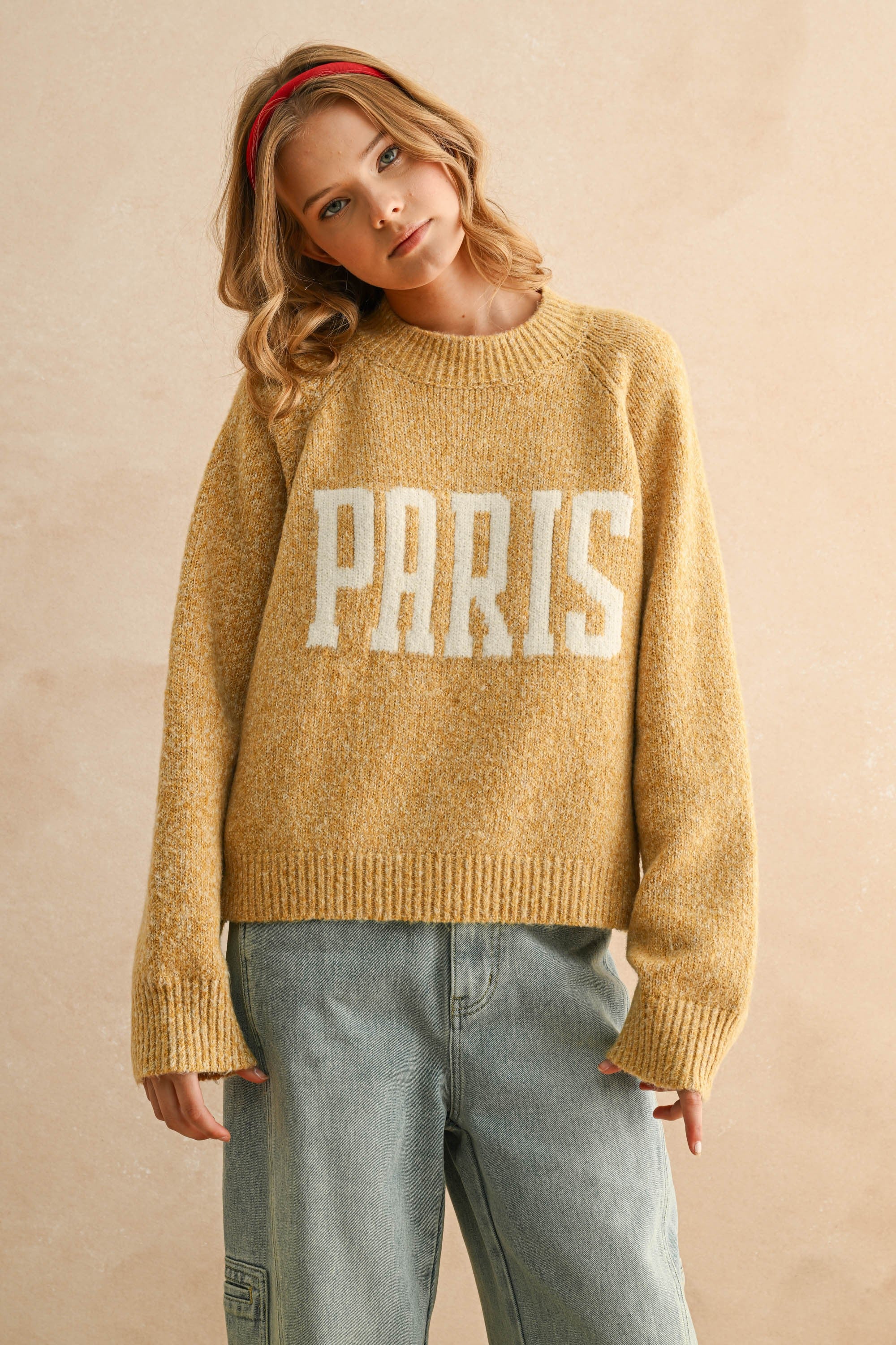 City print casual sweater in Paris butter with relaxed fit and letter front design