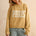 City print casual sweater in Paris butter with relaxed fit and letter front design