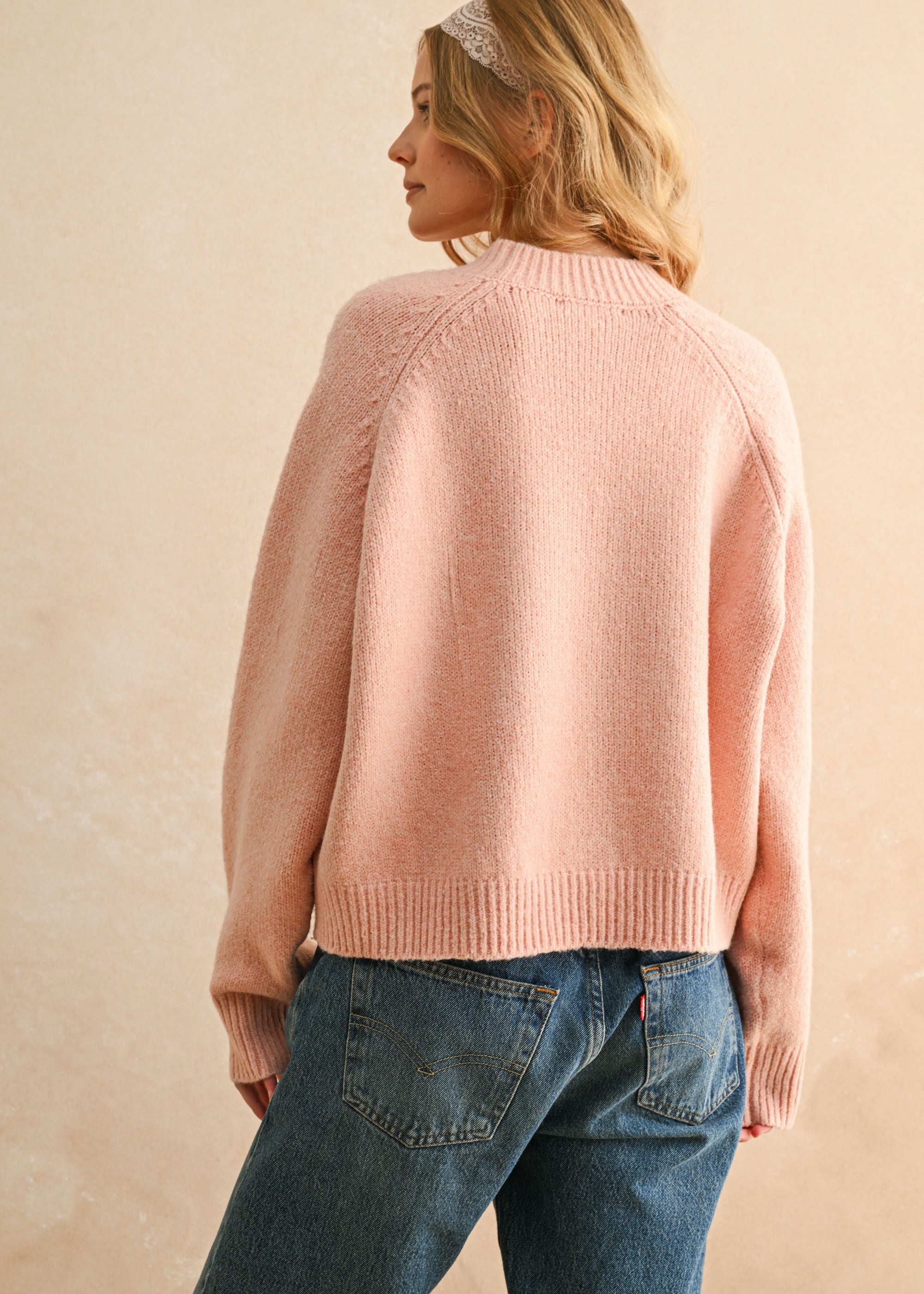 Back view of city print casual sweater in Paris pink