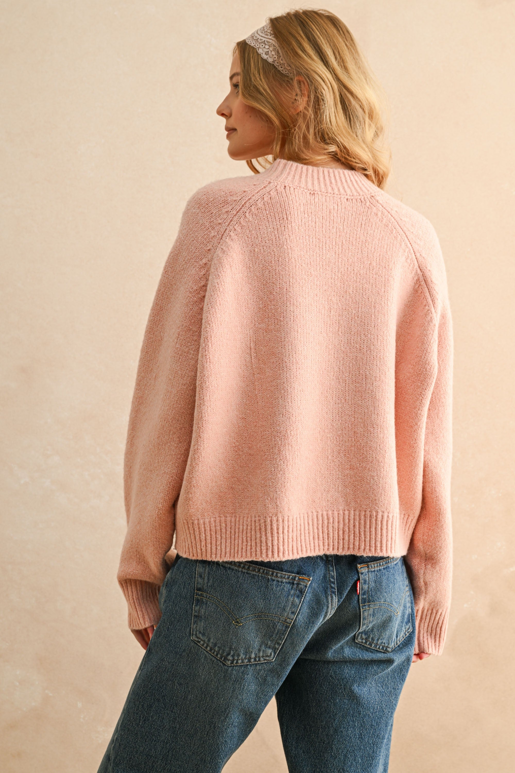 Back view of city print casual sweater in Paris pink