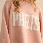 Close-up of Paris letter print on city print casual sweater in Paris pink