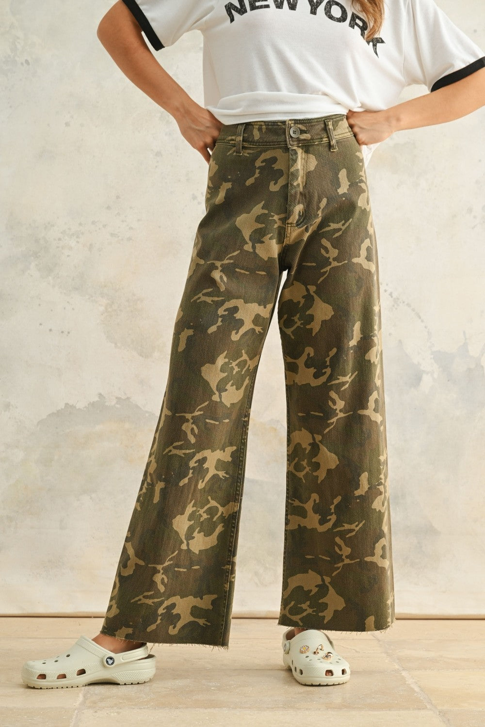 Colette High Rise Wide Leg Denim Pants in camouflage print, front view with wide-leg fit, high-rise waist, and raw hem.