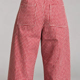 Back view of Colette wide-leg gingham pants in red showing the functional back pockets