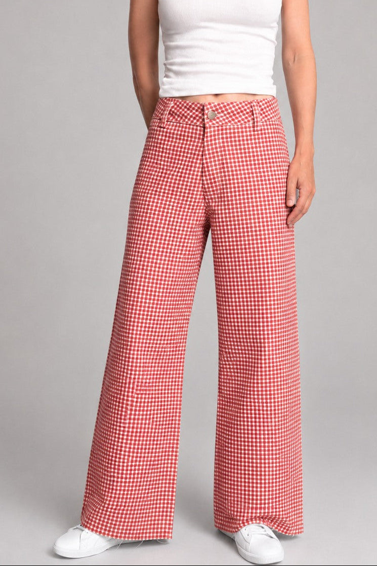 Front view of Colette wide-leg gingham pants in red with a high-rise waist and raw hem - front