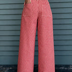 Woman wearing Colette red gingham wide-leg pants styled in a casual everyday outfit - back