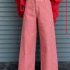 Woman wearing Colette red gingham wide-leg pants styled in a casual everyday outfit - front view