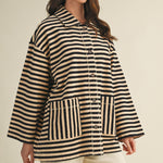 Angled front view of cozy in stripes button-up jacket with relaxed oversized silhouette