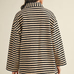 Back view of cozy in stripes button-up jacket in black combo