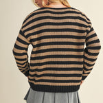 Back view of cozy stripe v neck pullover in black and mocha