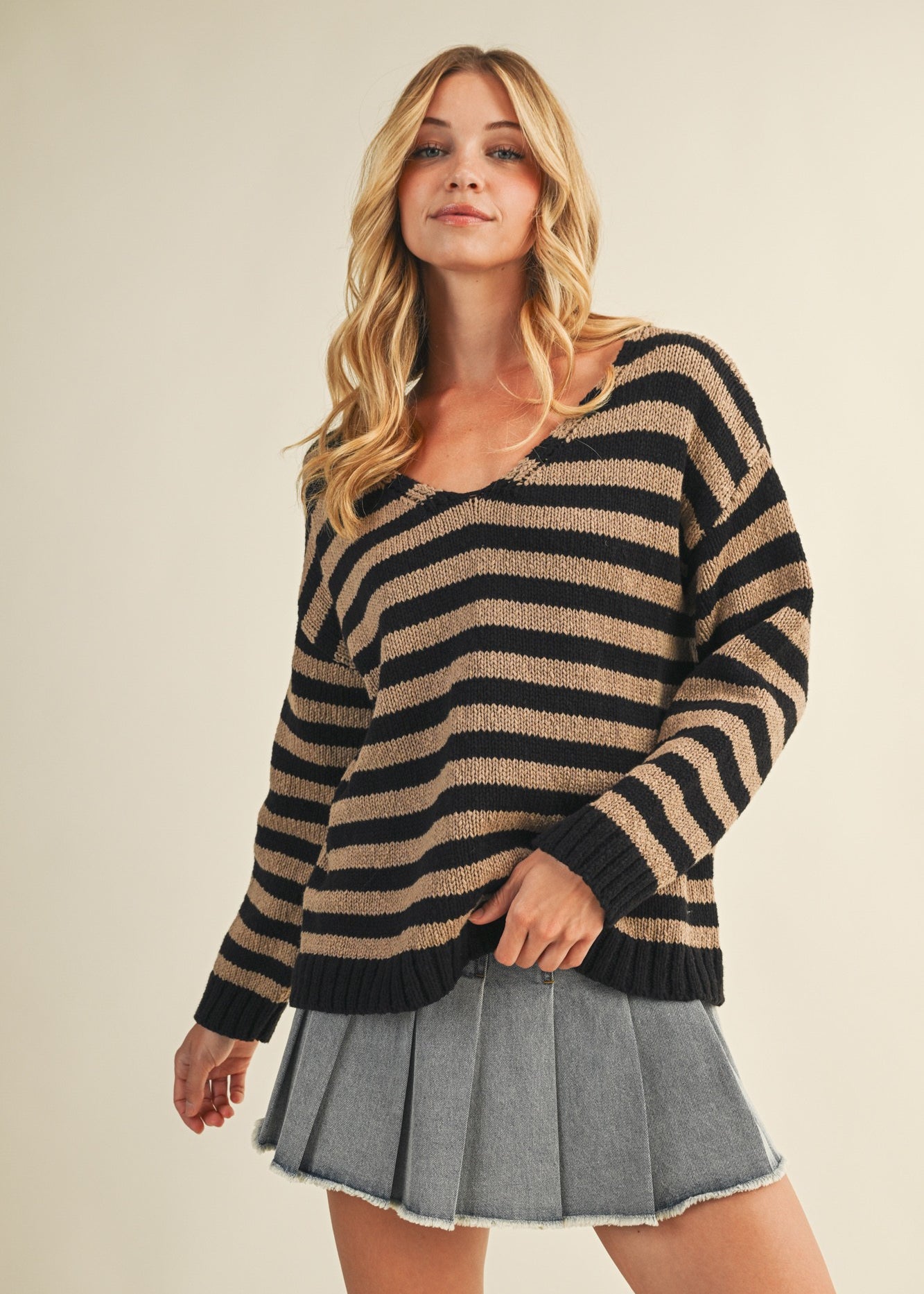 Cozy stripe v neck pullover in black and mocha styled for everyday wear