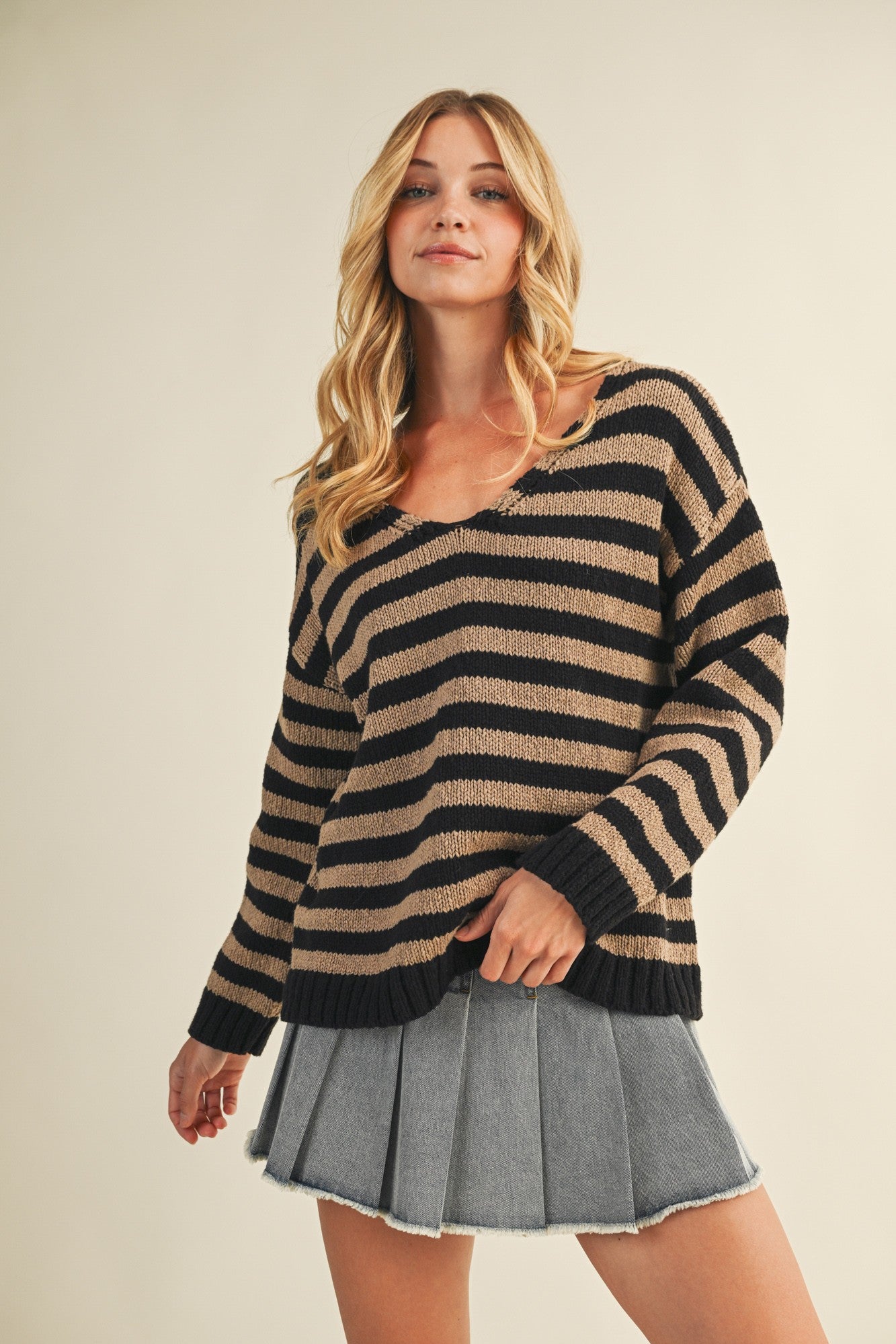 Cozy stripe v neck pullover in black and mocha styled for everyday wear