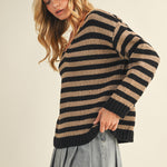 Side view of cozy stripe v neck pullover showing relaxed silhouette