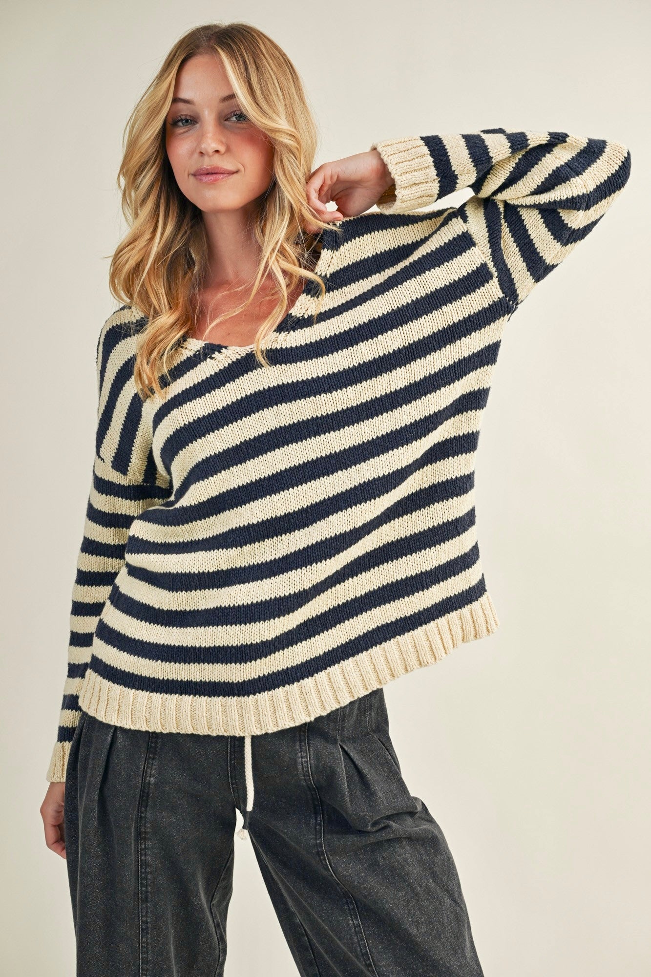 Cozy stripe v neck pullover in navy and ivory styled casually