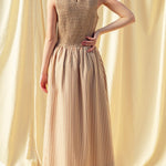 Back view of Darcy brown striped maxi dress with smocked bodice