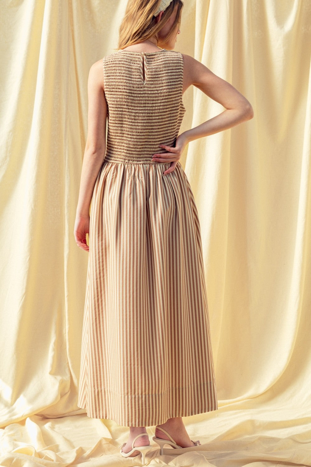 Back view of Darcy brown striped maxi dress with smocked bodice